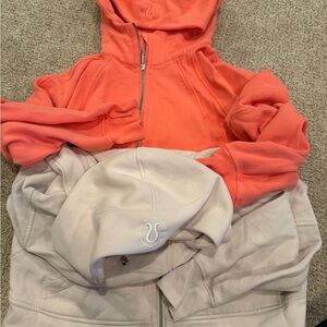 Lululemon Coral and light pink hoodies
